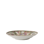 Decorative ceramic bowl with colorful patterns on a white background