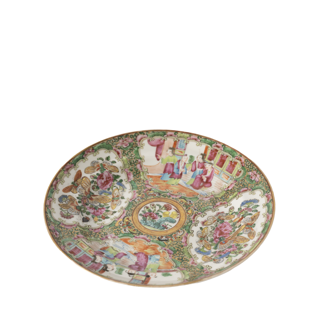 Decorative ceramic plate with intricate patterns on a white background