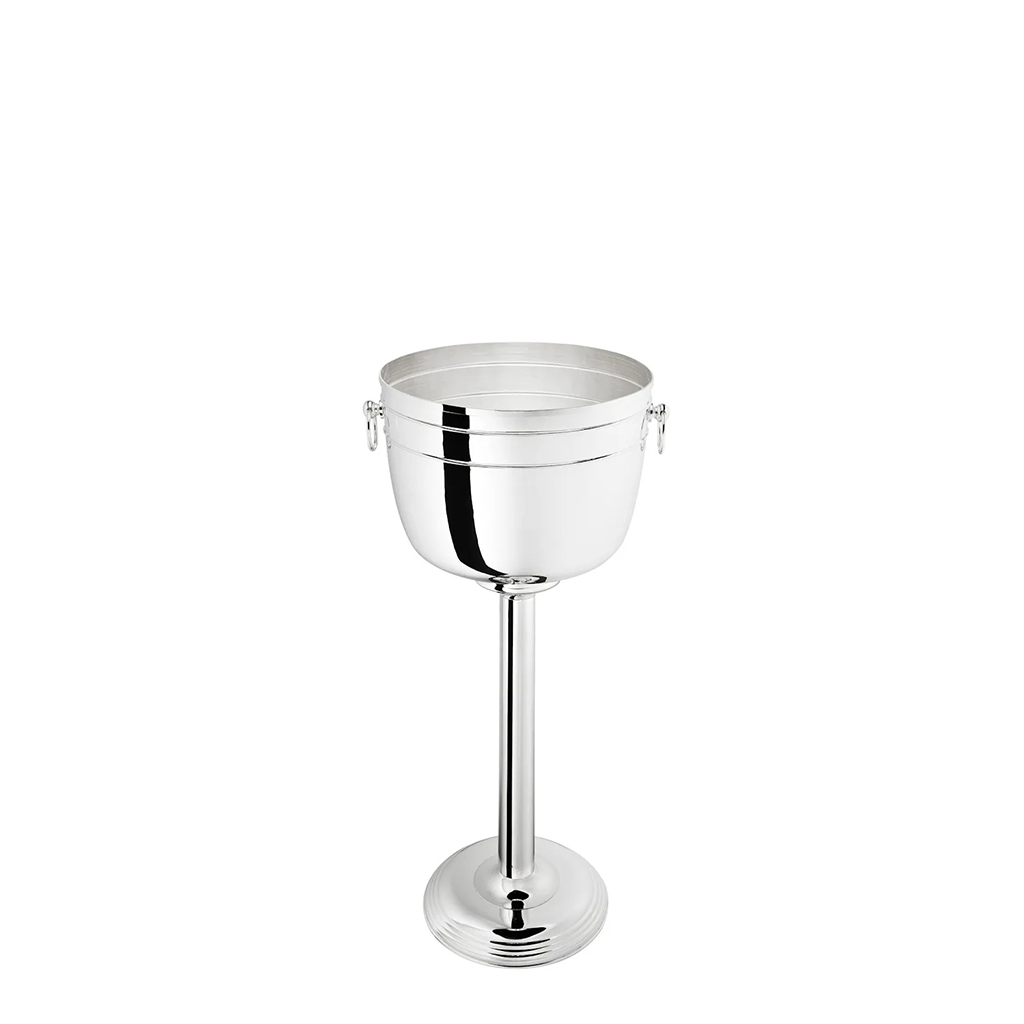 A polished silver metal ice bucket with a pedestal stand, featuring side handles on the bucket rim, set against a plain white background.