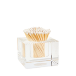 Clear glass container with matches on a white background