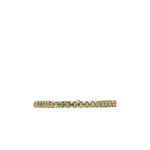 A delicate gold tennis bracelet featuring a row of small round-cut green gemstones, shown against a plain white background.