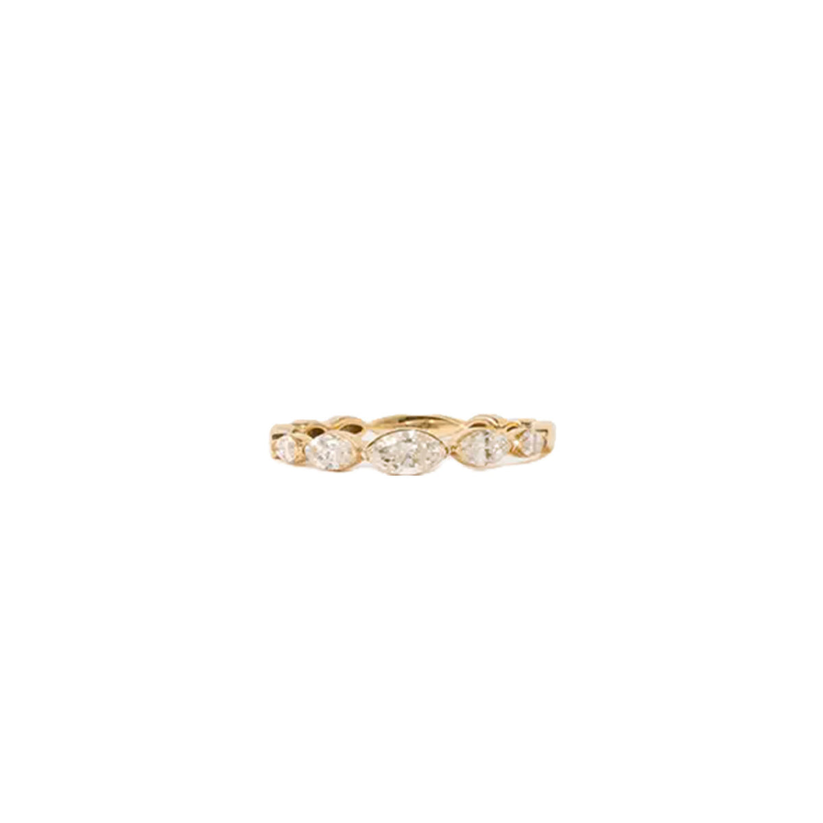 Gold ring with eternity diamonds on a white background