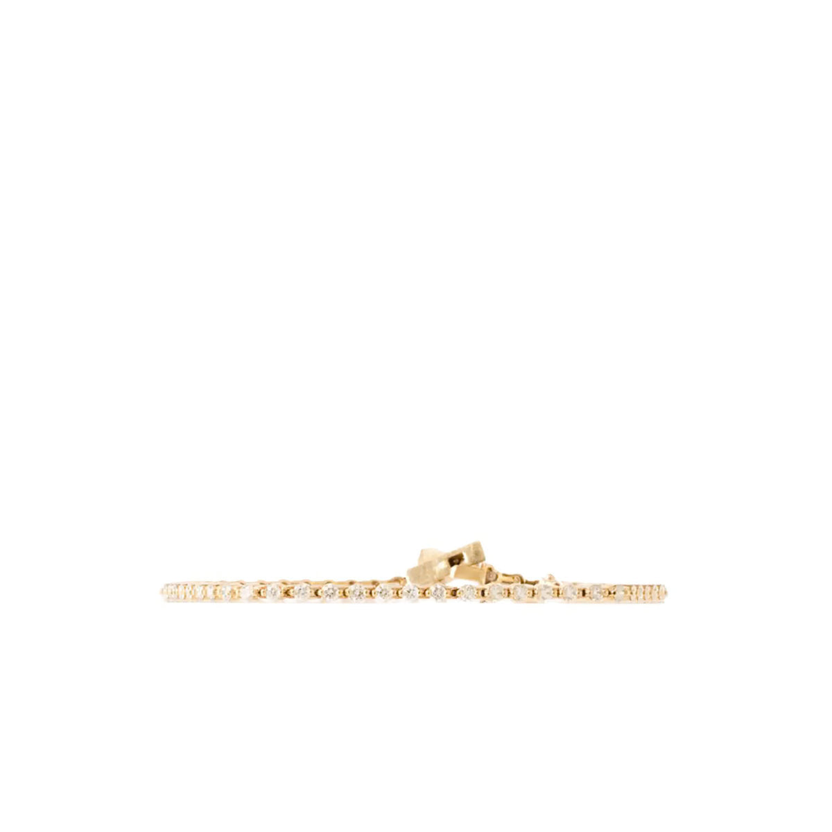 A delicate gold tennis bracelet with small clear stones, shown horizontally against a plain white background.