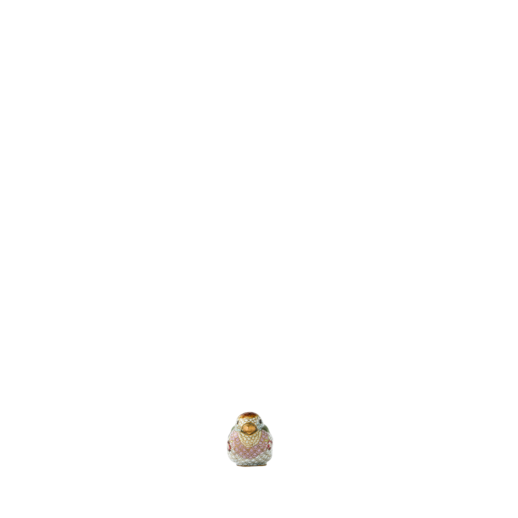 Small decorative bird figurine on a white background
