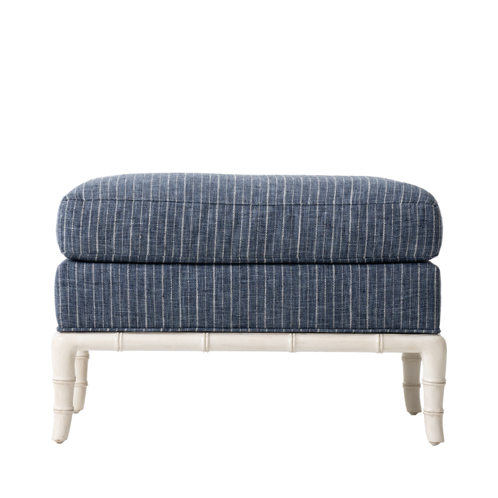 Blue and white striped ottoman with white legs on a white background