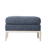 Blue and white striped ottoman with white legs on a white background