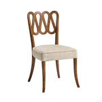 Wooden chair with decorative backrest and beige cushion on a white background