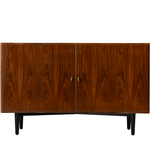 Wooden sideboard with two doors on a white background