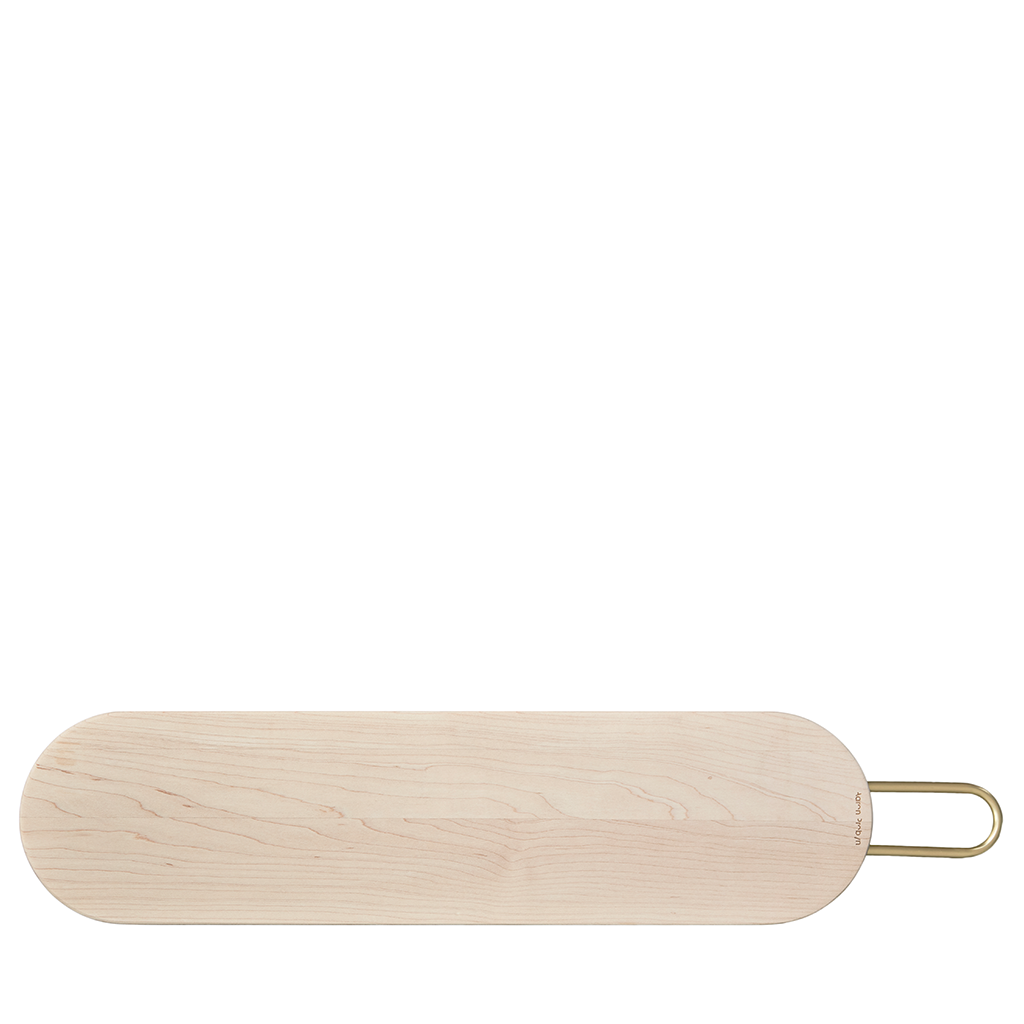 Wooden paddle with a gold handle on a white background