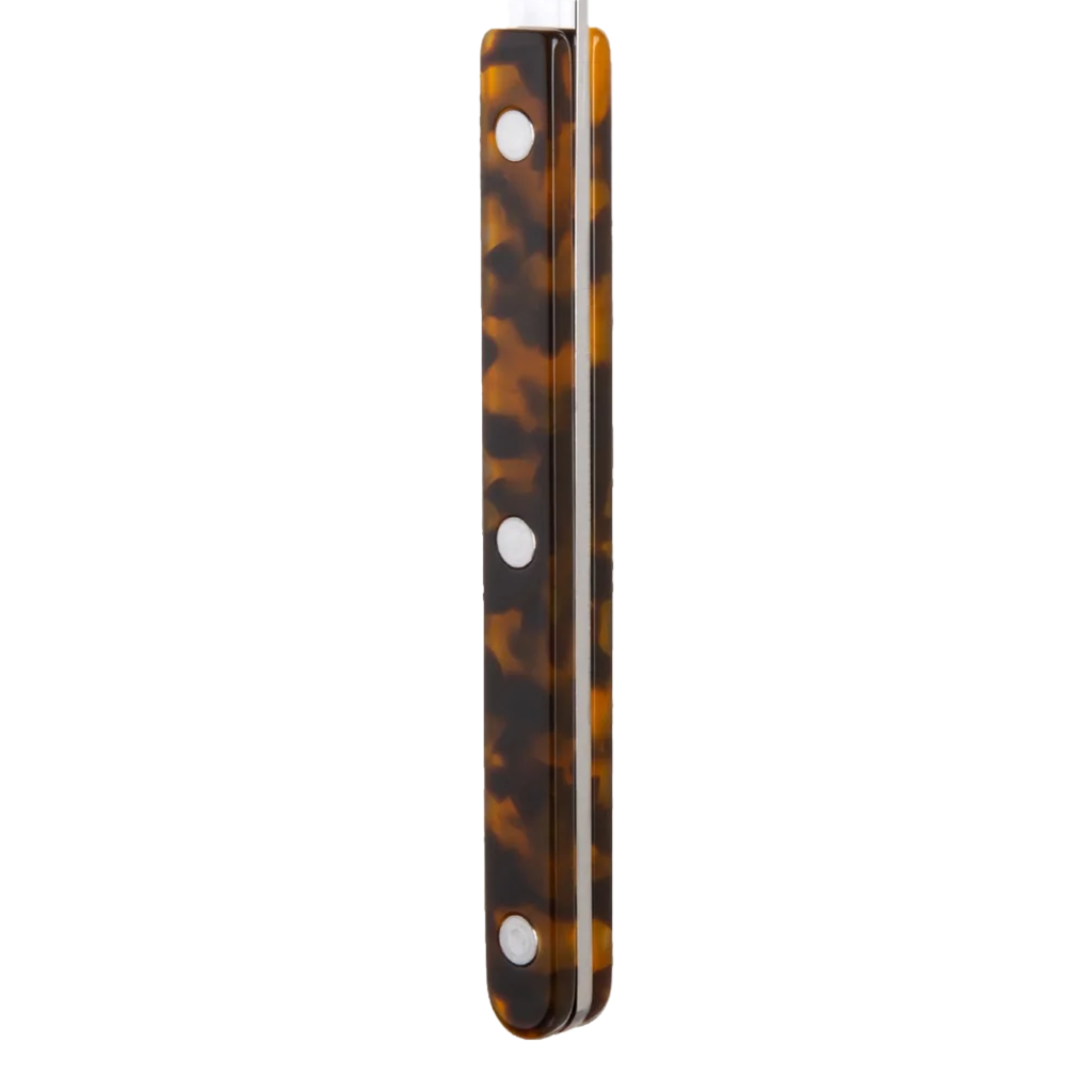 Tortoiseshell patterned handle on a white background