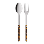 Spoon and fork with tortoiseshell handles on a white background