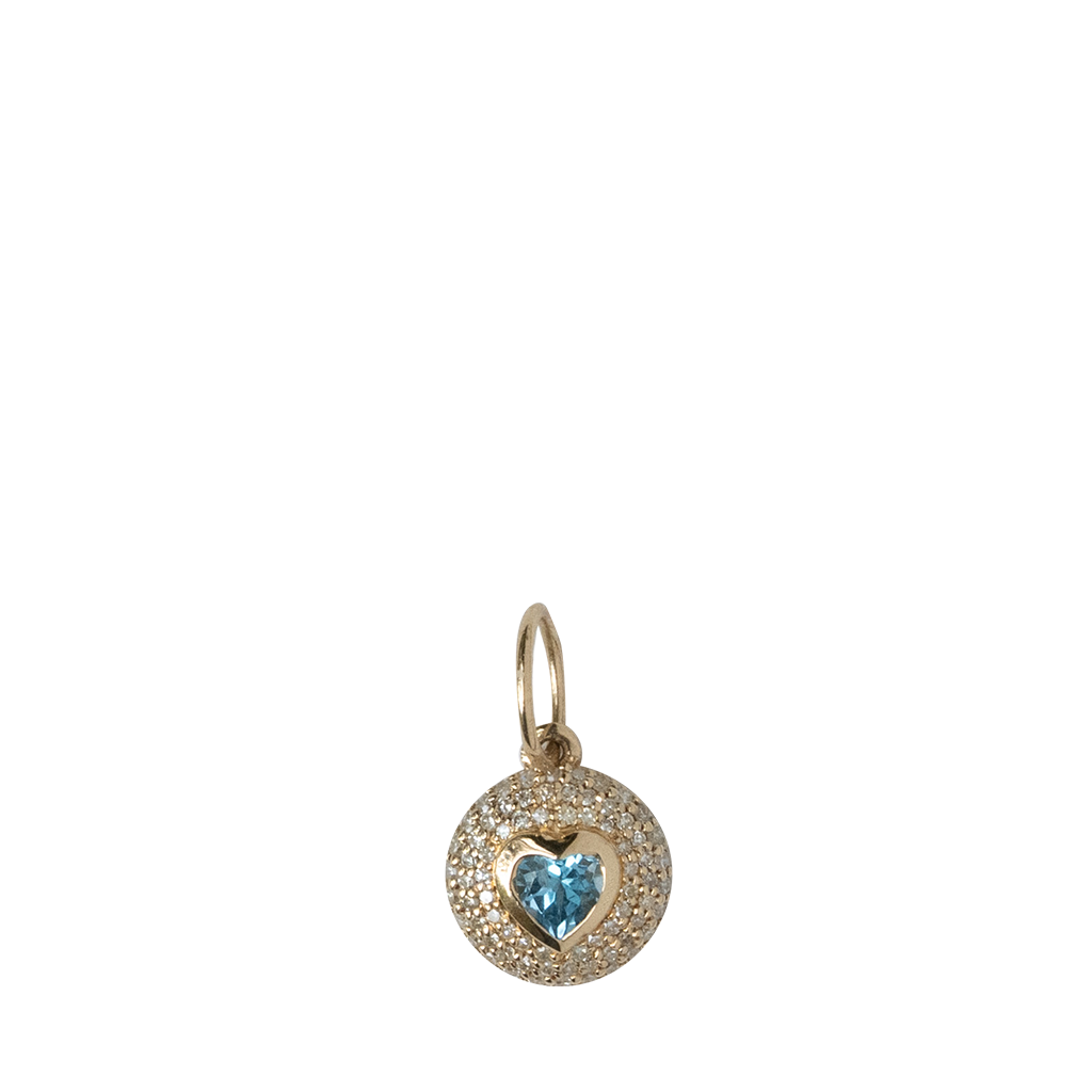 Gold pendant with a heart-shaped blue gemstone on a white background