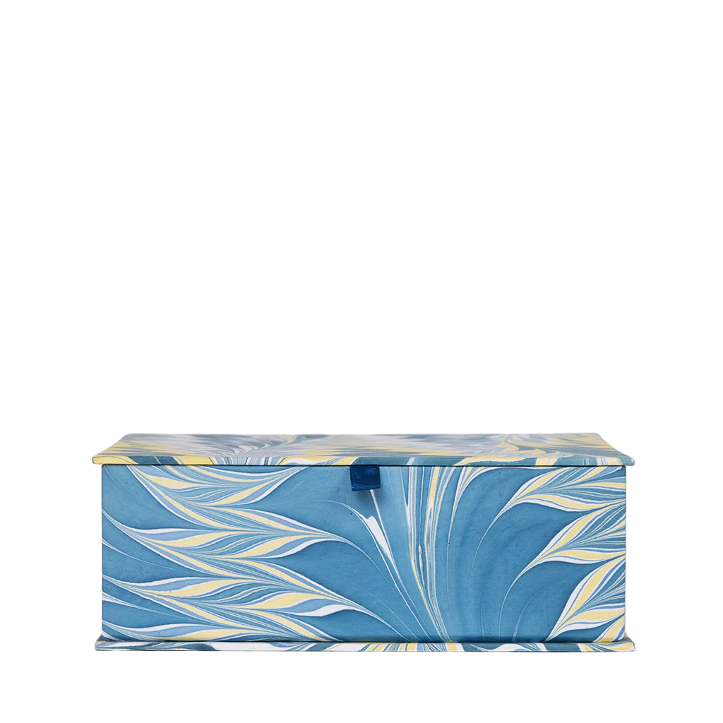 Blue storage box with marble pattern on a white background