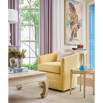 yellow swivel chair in home