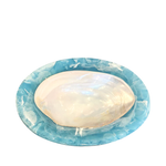 blue resin caviar dish with natural shell inlay on a white background