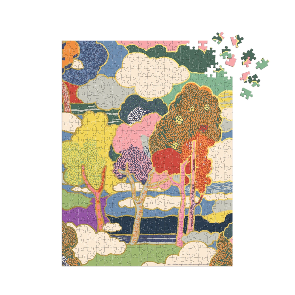 Colorful puzzle with trees and clouds on a white background