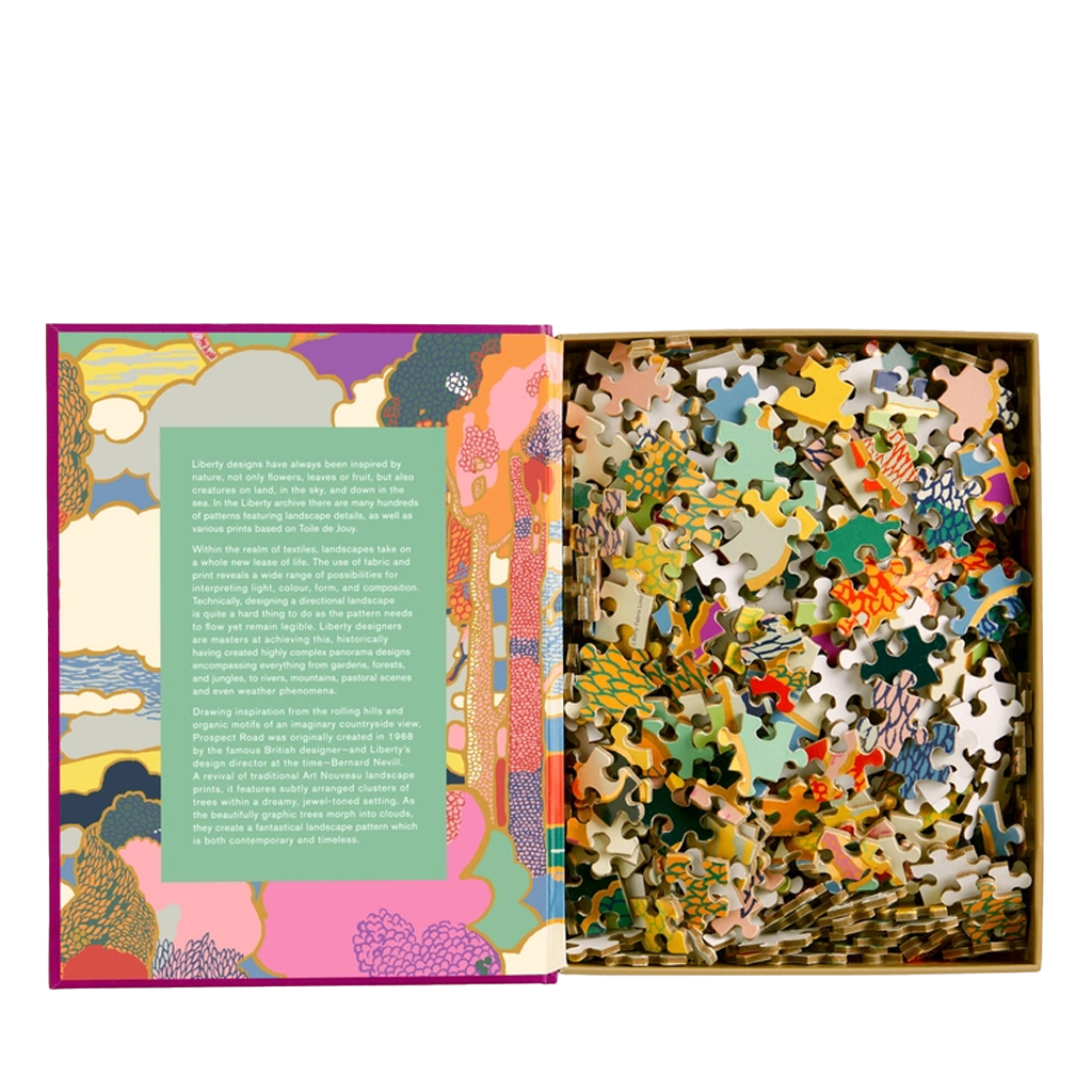 Jigsaw puzzle with colorful pieces and a decorative box on a white background