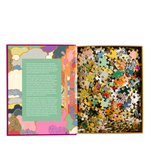 Jigsaw puzzle with colorful pieces and a decorative box on a white background