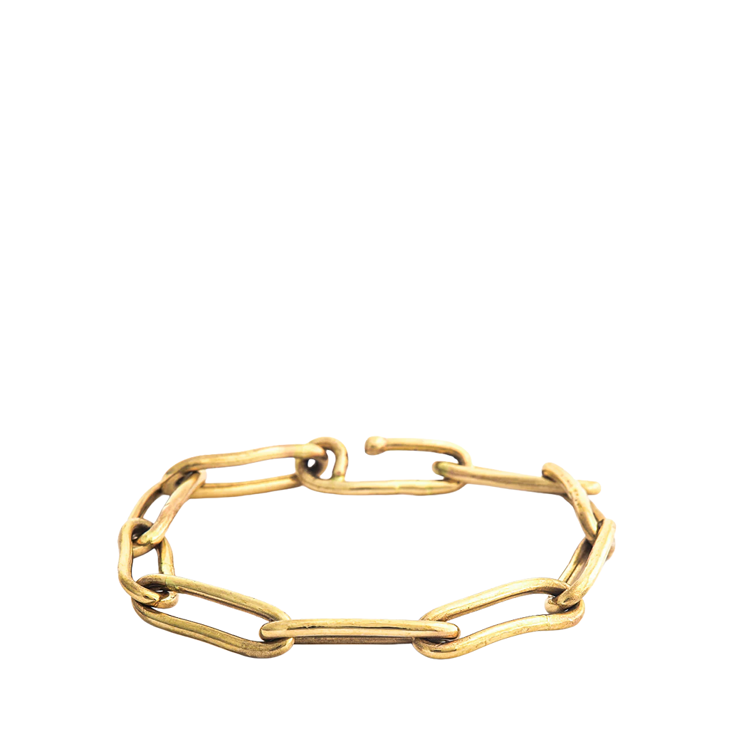 Gold bracelet on a white background