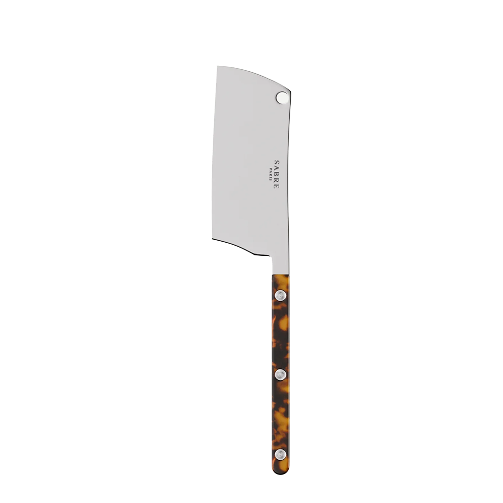 Cheese knife with tortoiseshell handle on a white background