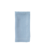 Light blue napkin on a white background