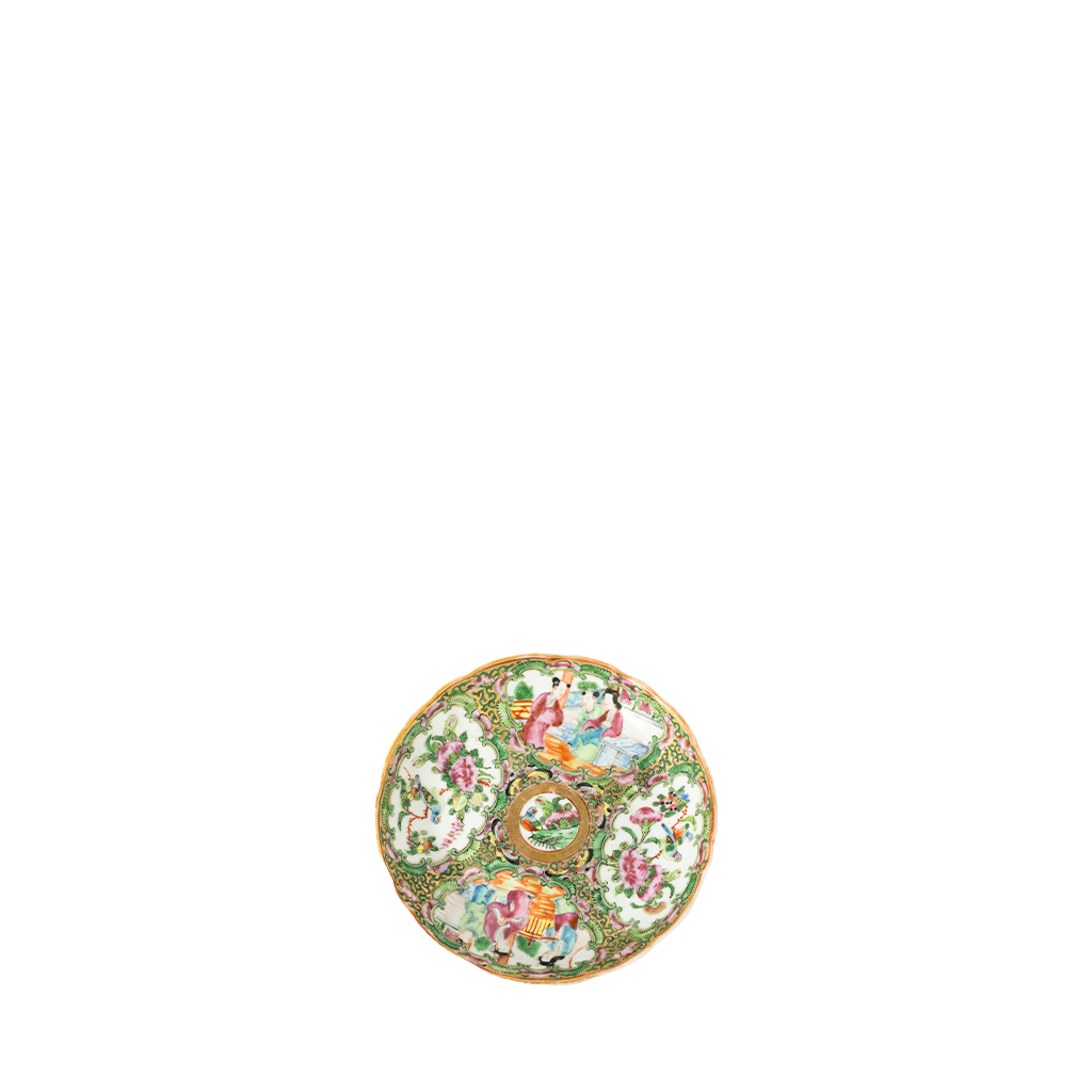 Decorative plate with floral and bird pattern on a white background