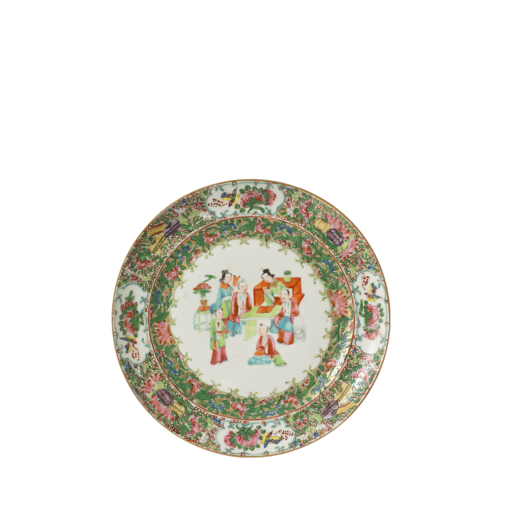 Decorative ceramic plate with colorful floral and figurine design on a white background
