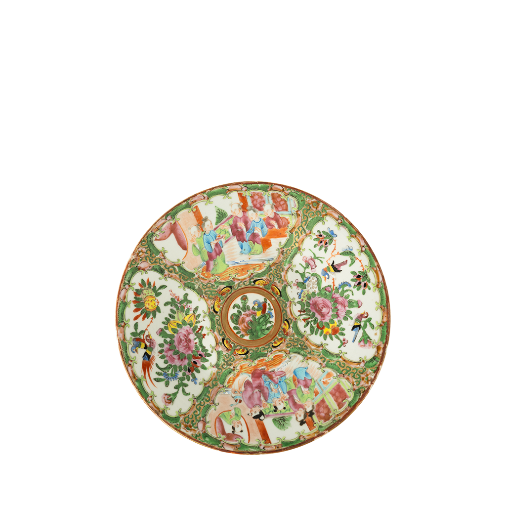 Decorative ceramic plate with colorful floral and figurine design on a white background