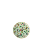 Decorative plate with floral and butterfly design on a light green background
