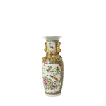 Tall porcelain vase with detailed Famille Rose floral patterns and gold decorative handles.