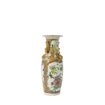 Tall white porcelain vase with colorful floral and bird motifs, ornate gold accents, and intricate raised detailing around.