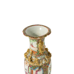 Decorative ceramic vase with intricate designs on a white background