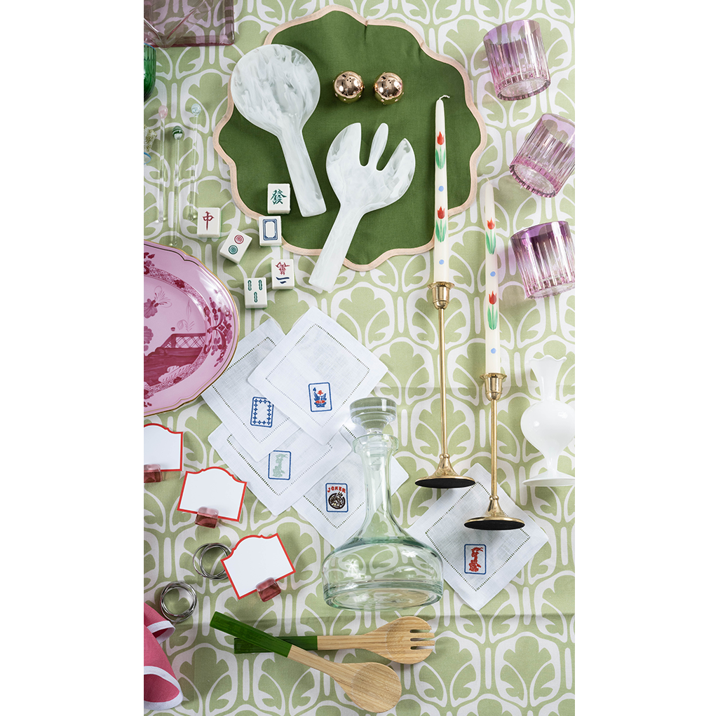 Pink and purple ombre small tumbler with ribbed glass texture and rounded shape and other accessories