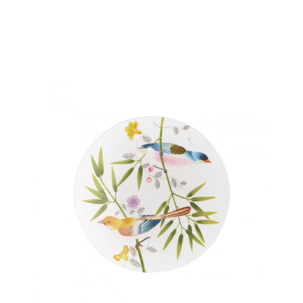 white dessert plate with birds