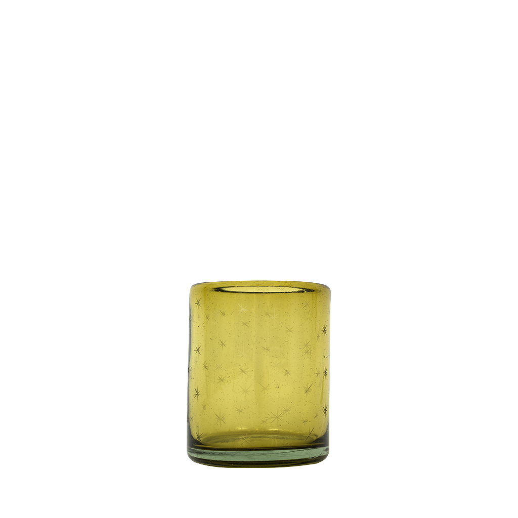 Green-tinted Etoile rocks glass with subtle star-like bubbles in the glass design.