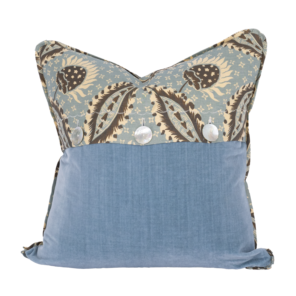 back of brown and blue pillow, with pearl buttons