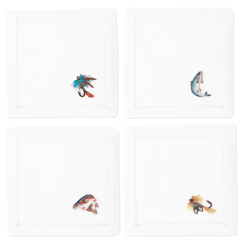 white square cocktail napkins with embroidered fish details