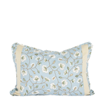 blue and white pillow with tree branches