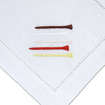 golf-themed napkin close up image of tees