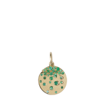 Gold pendant with green gemstones on a white background