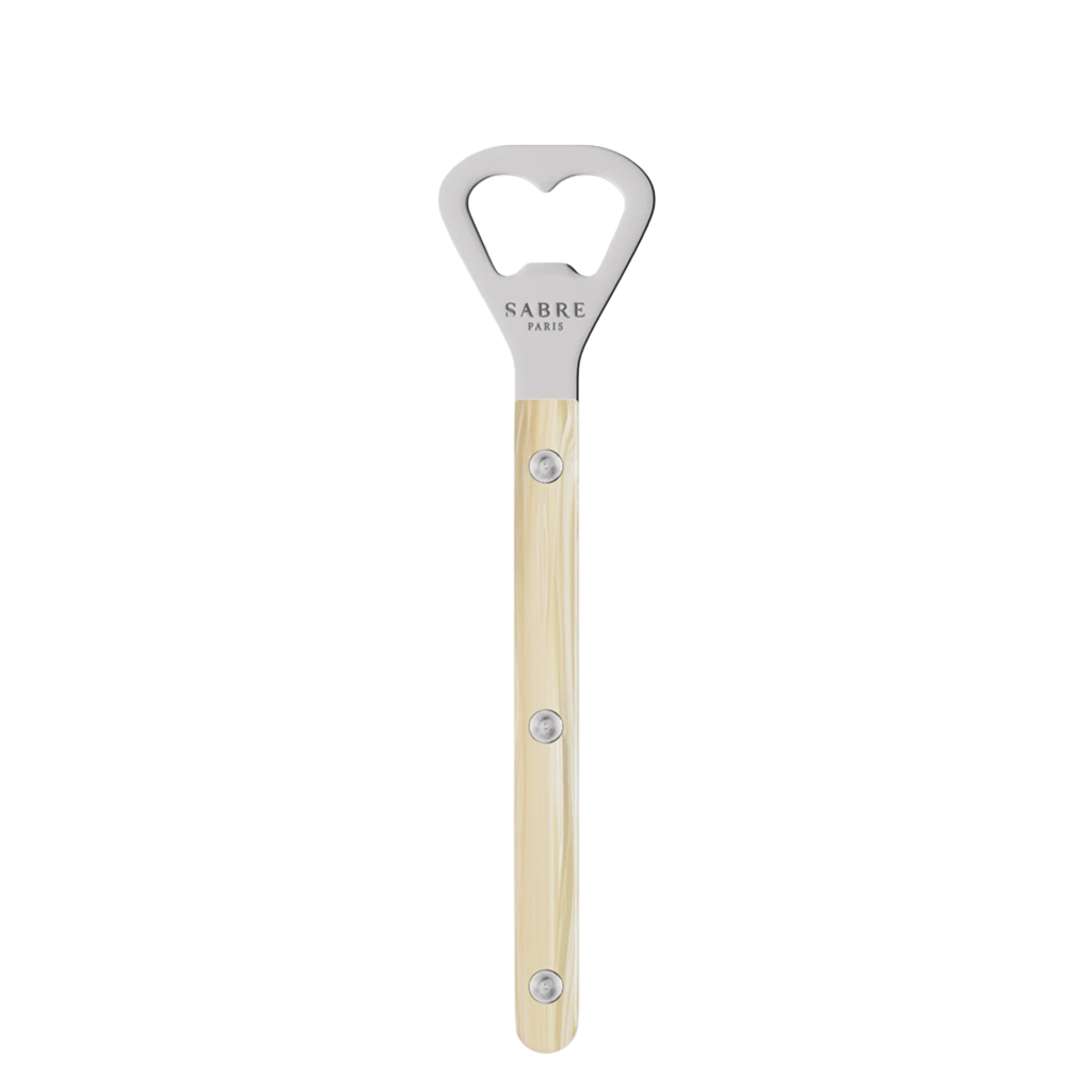 Stainless steel utensil with beige handle on a white background