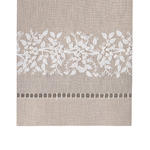 Beige linen tablecloth featuring a wide white floral lace border and a decorative cutwork band near the bottom.