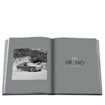 Open book showing a black and white photo of a car and text '1962 DR. NO'