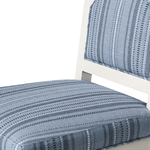Close-up of a chair with blue striped cushion on a white background