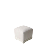 Beige cube-shaped ottoman on a white background