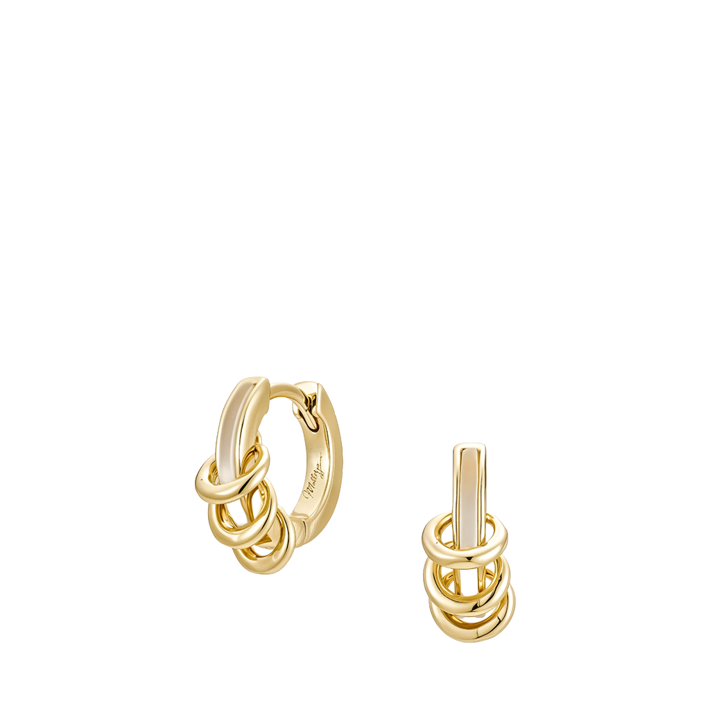Gold hoop earrings on a white background