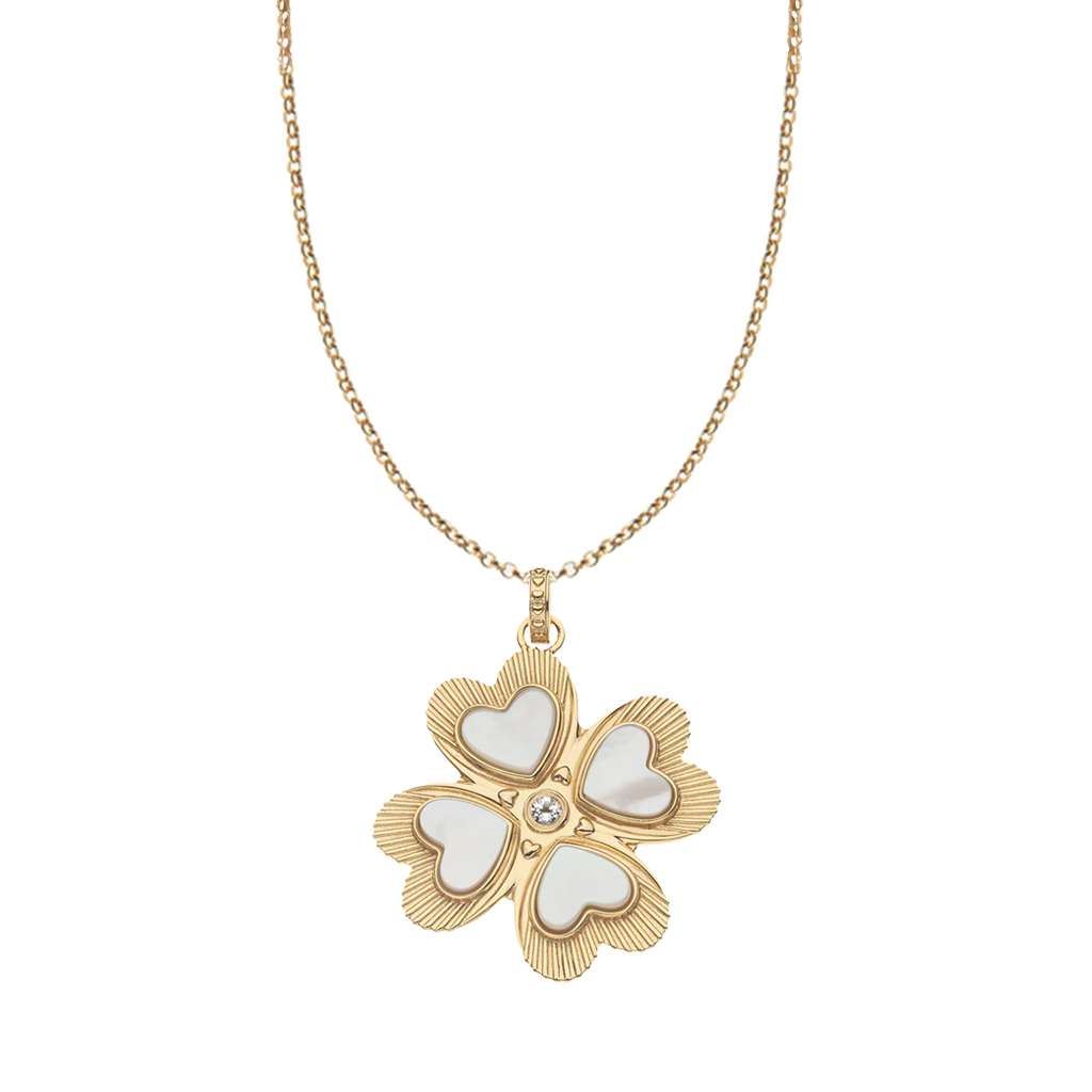 Gold necklace with a four-leaf clover pendant on a white background