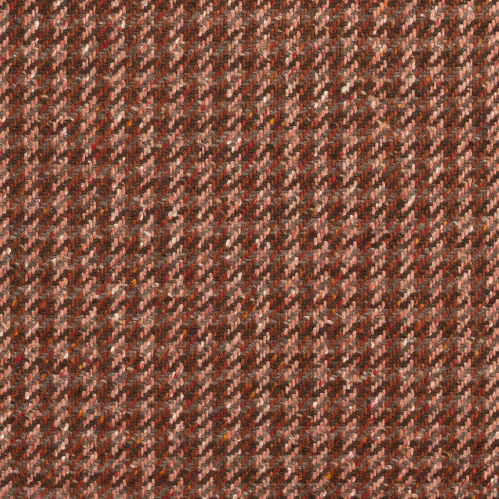 Close-up of brown and beige herringbone pattern fabric