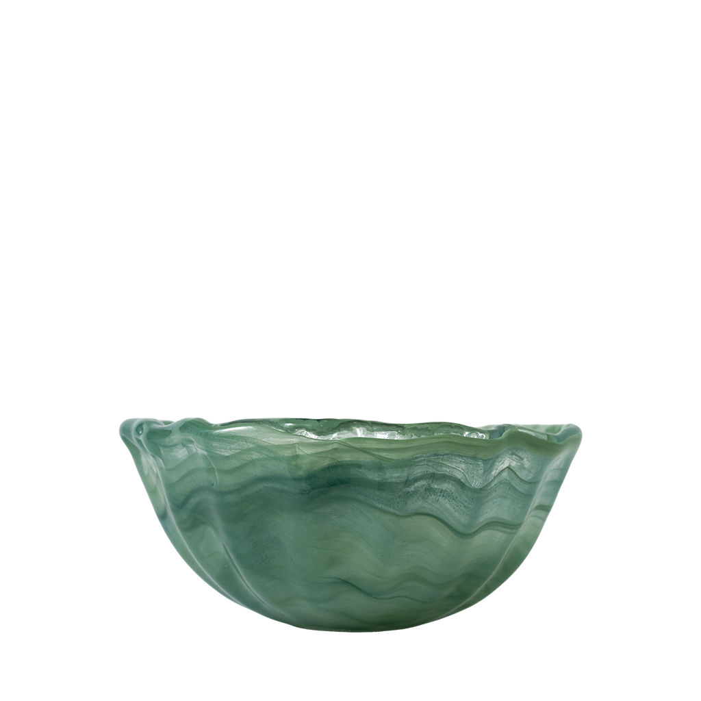Green glass bowl on a white background