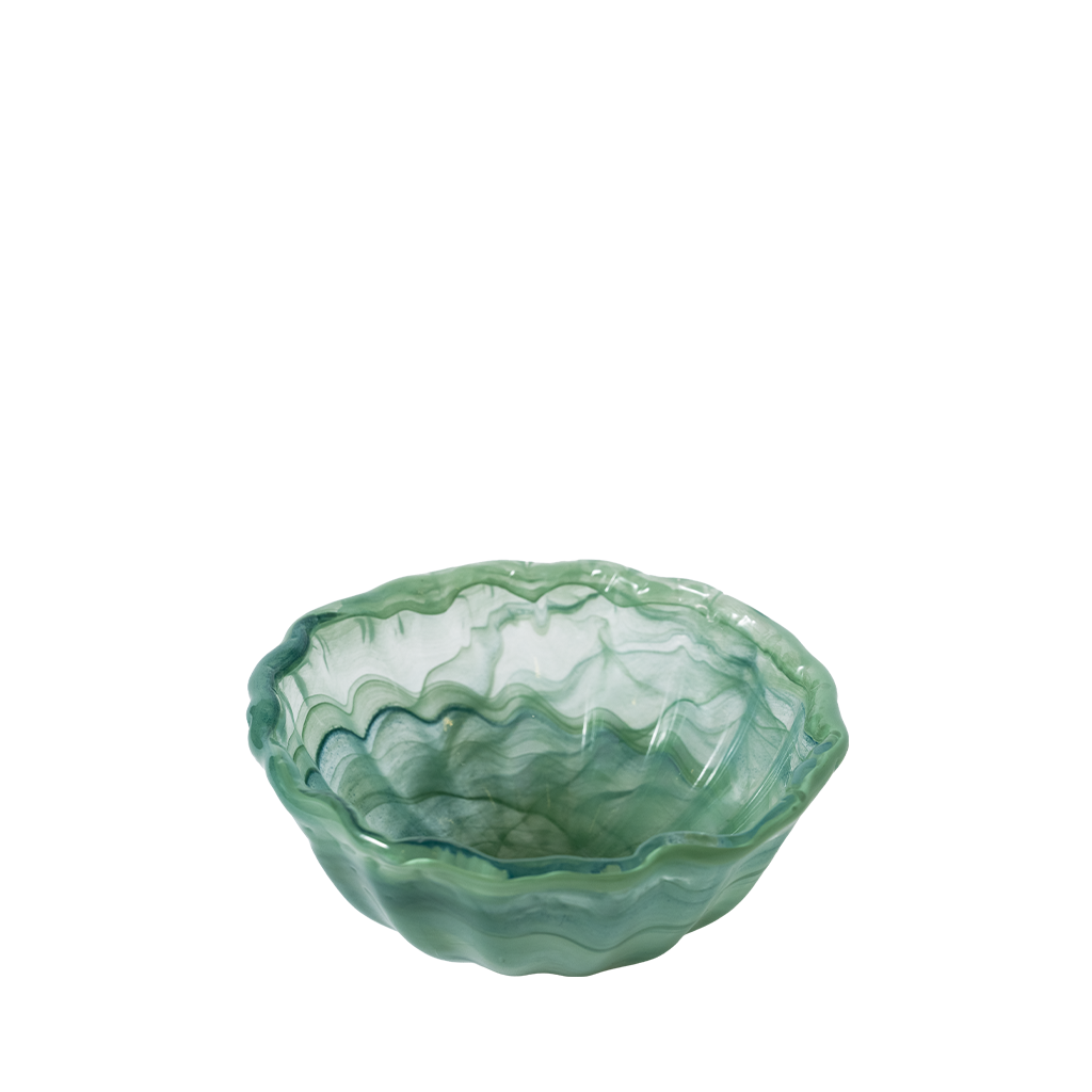 Green glass bowl on a white background